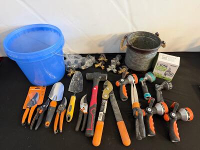 Assorted Garden Tools and Watering Accessories with Fiskars Pruners and RainPoint Timer