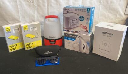 Mixed Electronics Bundle: Solar Power Banks, Netvue Orb Cam, PurSteam Steamer, Sharp Clock, Lantern