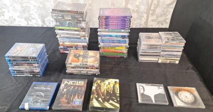 Lot Of (60) Assorted DVD & Blue Ray Video Disks & (32) Assorted Music CD's