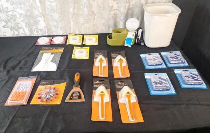 (1) 4-Piece Mini Hook & Pick Set, (1) 6-Piece Spring Clamp Set, (1) 4" Steel Putty Knife, (1) 4-Piece Plastic Putty Knife Set, (5) Rolls Of Double Sided Foam Tape, (4) Corner Paint Brushes, (4) 15-Piece Eyeglasses Repair Kits, (1) LED Organizer Lamp & (1)