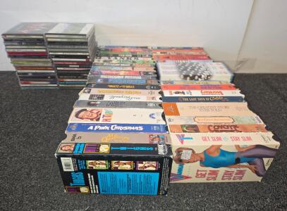 Mixed Lot of VHS Tapes and CDs &ndash; Includes "Home Alone," "Titanic Season One/Two," Celtic Music