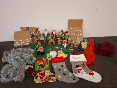 Assorted Christmas Decorations Lot: Stockings, Plush Figures, Tree Skirt, Garland, Figurines