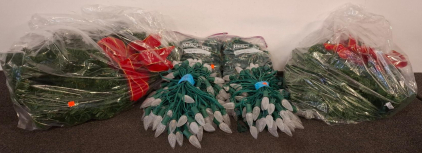 Christmas LED String Lights &ndash; 2x 120 C9 Warm White, 2x 500 Multi-Color Mini, And 2 Strings Of Green Garland (All Lights Powered On)