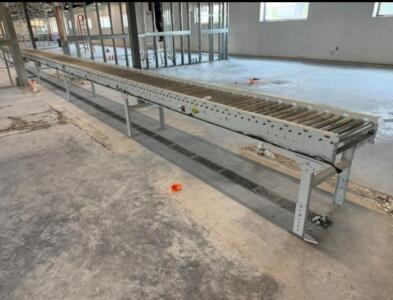 Hytrol conveyor system parts 4 10ft section, 7 and half ft section with the control box, 5 ft and corner piece and the remainder of the legs.