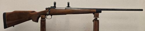 Remington Model 700, .300 Win Mag Bolt-Action Rifle, Walnut Stock, Muzzle Brake, Scope Rings