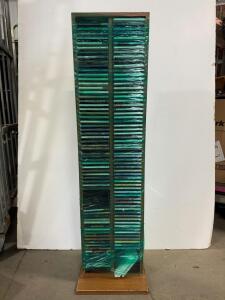 Tall Wooden CD Storage Rack with Approx. 120 CDs Assorted Genres, Free-Standing, Laminate Finish including Frank Sinatra, Joan Sebastian, Christmas music, Hispanic musical.