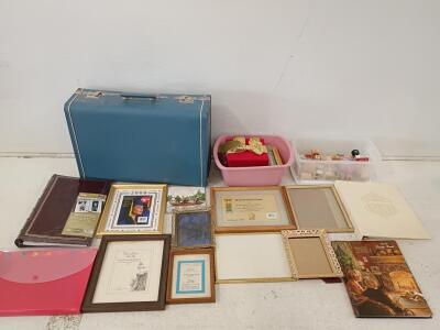 Vintage Blue Hard-Shell Suitcase with Assorted Frames, Albums, and Stamps