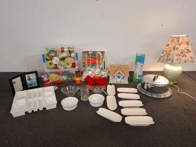 Gift Wrapping Supplies Lot &ndash; 100+ Ribbons, Bows, Tags, Storage Bins, Holiday Wrap, table lamp, milk shake mixer, both powered on. Kitchenware and more