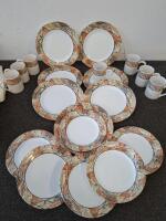 Corelle Leaf Pattern 23-Piece Dinnerware Set with Red Canisters, Frying Pans, and Mugs - 2