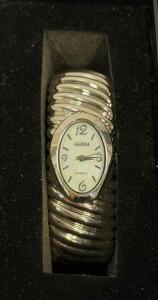 AGENDA Women&rsquo;s Quartz Silver-Tone Ridged Hinged Bangle Bracelet Watch Oval Dial Analog