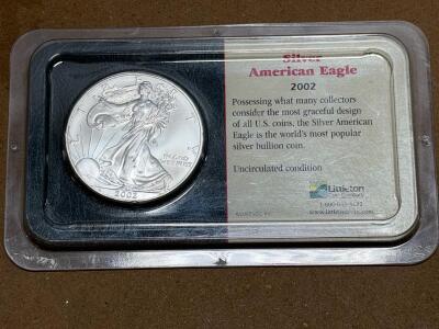 2002 American Silver Eagle 1 oz Coin &ndash; Uncirculated, Littleton Packaging, 0.9993 Silver