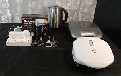 (1) Black & Decker Cordless Handi Mixer, (1) Small George Foreman Grill, (1) Black & Decker Electric Grill & (1) Krups Electric Electric Kettle