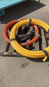 Roll of 1” Gas Line, Roll of 3/4” Poly Line and a Roll of Alum 4 awg Cable