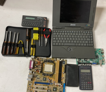 Zenith Laptop, Tool Kit, Thesaurus/Spellchecker, (2) Calculators, & Motherboard