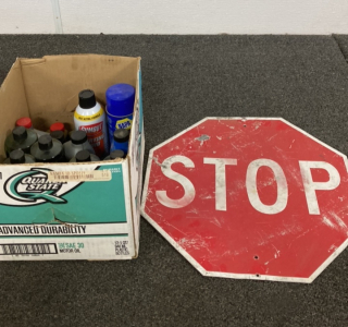 Assorted Automotive Fluids And Flagger Sign