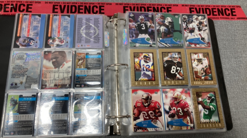 Binder of football cards including cards from the 49ers, Jets and more