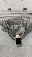 London Fog purse and a smart watch