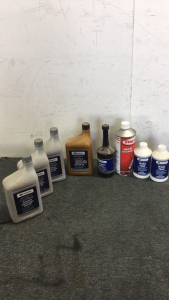 (2) Subaru Brand Brake Fluid (1) Torco Race Fuels Accelerator (1) Subaru Synthetic Motor oil SAE 5w-30 (3) Subaru Automatic Transmission Fluid