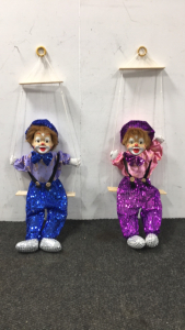 (2) Swinging Puppet Decorations