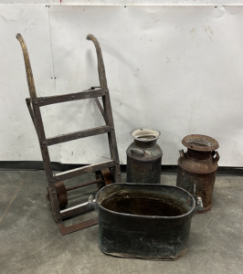 (2) Vintage 21" H Milk Cans, (1) Vintage 26" W x 13" D x 13" H Trough, and (1) Vintage 48" H Hand Dolly