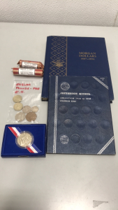 English Pounds, 1/2 dollar Liberty coin, Lincoln “S” Cents and empty coin collector books