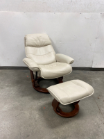 Cream Colored Reclining Chair with Foot Rest