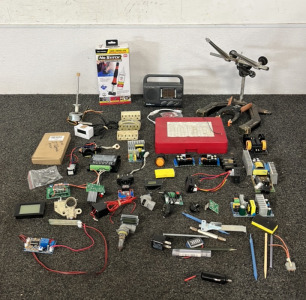 Portable AM/FM Receiver, O Ring Service Kit, Handheld Heat Iron, and Assorted Circuitry, Displays and Other Items