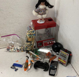 Claw Machine, Legos, Calculator, Porcelain Eskimo Girl & Hexbugs!