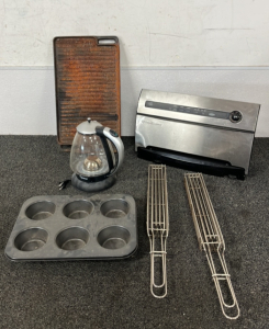 Capresso 6 Cup Electric Tea Kettle (Powers On), FoodSaver V3840 Vacuum Sealer (Powers On), 14"x11" Muffin Pan, (2) 21"x3" Grill Baskets, and 10"x18" Griddle