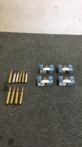 (4) Boxes Of Federal .22LR Ammunition (6) Individual 7mm Ammunition (4) Individual .338 REM Ultra Mag Ammunition