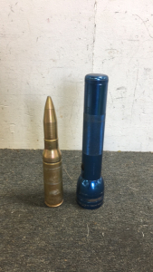 (1) 25MM Dummy M794 Round (1) Mag-Lite Flashlight