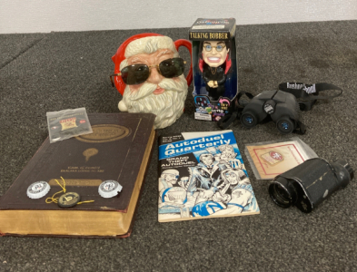 Ozzy Bobble Head, Santa Mug, Ray Ban Sunglasses, Autoduel Quarterly Magazine, NFL 49ers Pins, Bushnell Binoculars, Masonry Defined Book