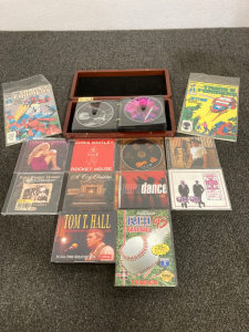 Assortment Of CDs And 2 Transformer Comic Books