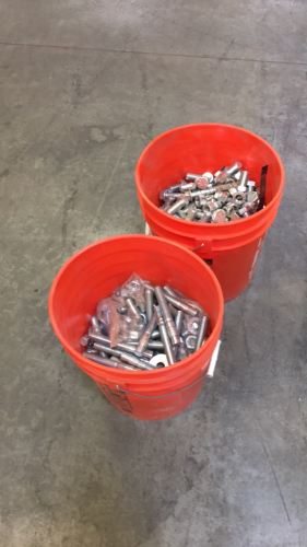 (1) 5-Gallon Home Depot Buckets 3/4 Full of 3/4” Nuts And Bolts (1) 5-Gallon Bucket Of 5” Anchor Bolts Lot # 67