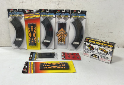 (8) Assorted Ho Scale Electric Racing Accessories and (2) SCX Slot Car Guides With Fitted Braids