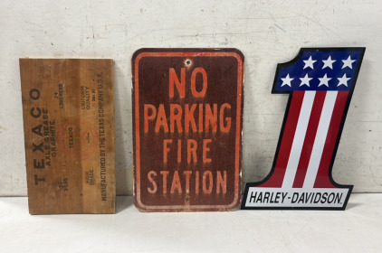 17" W x 9.5" H Wooden Texaco Axle Grease Sign, 12" W x 18" H Metal No Parking Sign, and 12" W x 18" H Harley-Davidson Die-Cast No. 1 Sign