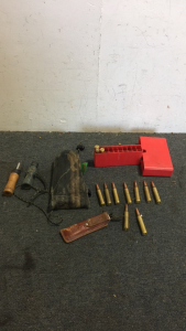 (2) Duck Calls (1) Gerber Knife Sharpener (9) Rounds Of 7mm Ammo (1) unknown primos hunting tool