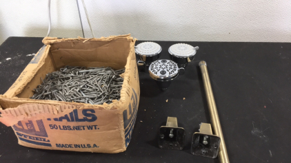 (1) Box of Nails (3) Shower Heads (1) Towel Rack