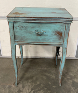 Elgin Sewing Machine In Teal Cabinet