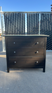 43" W x 20" D x 38" H Glass-Top 3-Drawer Dresser with Assorted Items