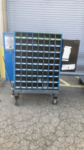 Hardware organizer on cart full of miscellaneous hardware