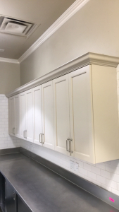 (4) Sets Of Tan Cupboards With Crown Molding