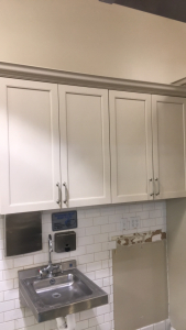 (2) Sets Of Tan Cupboards