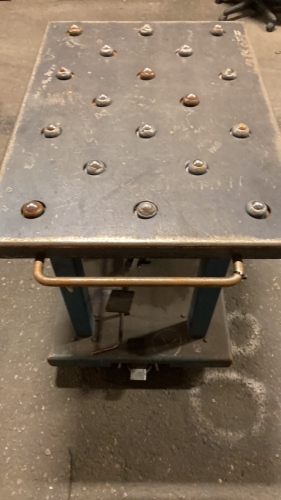 Metal lift table with roller top