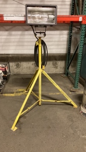 Shop light on metal three leg stand