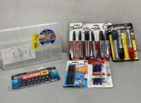 (1) Janlynn Needlecraft Floss Organizer (3) Sharpie Packs (1) Paper Mate Gen Pen Pack (1) Uni-Ball Pen Pack (1) Rayovac Battery Pack