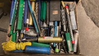 Drawer full of drillbits and drilling accessories