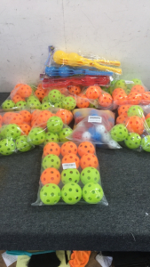 (9) Bags of Whiffle Balls, (4) Whiffel Ball Throwers