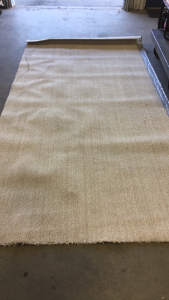 (1) 12&rsquo; Roll Of New Tan Carpet