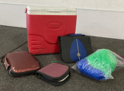 Coleman Cooler With CD Cases And (2) Ponchos